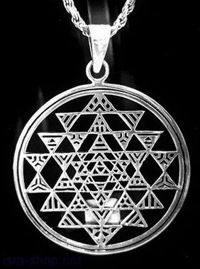A metal amulet that attracts good luck in the form of a pendant. 